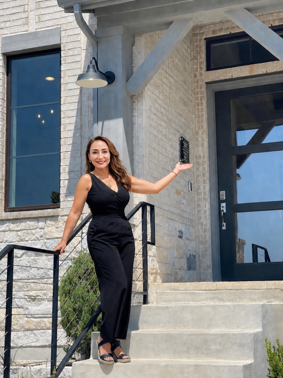 Araceli Hart showing an Austin luxury home Realtor Araceli Hart welcoming clients to a luxury new-construction home in Austin, Texas